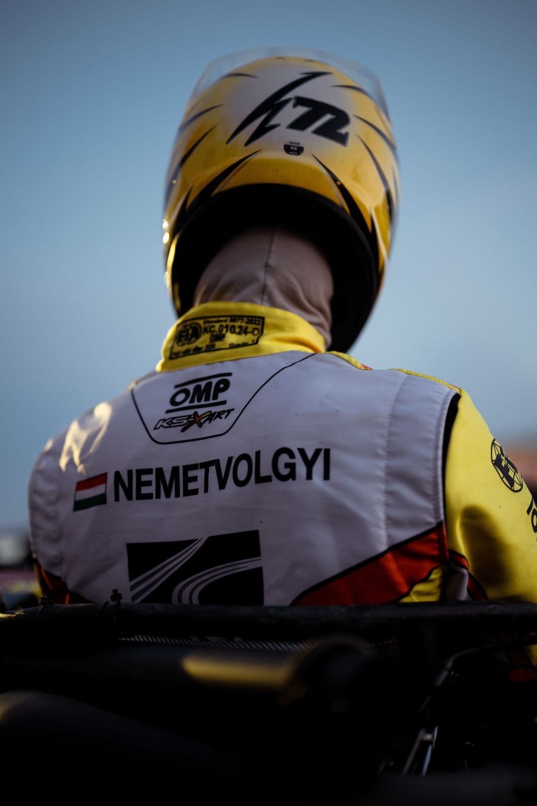 From behind: his name and the Hungarian flag on the race suit, Le Mans