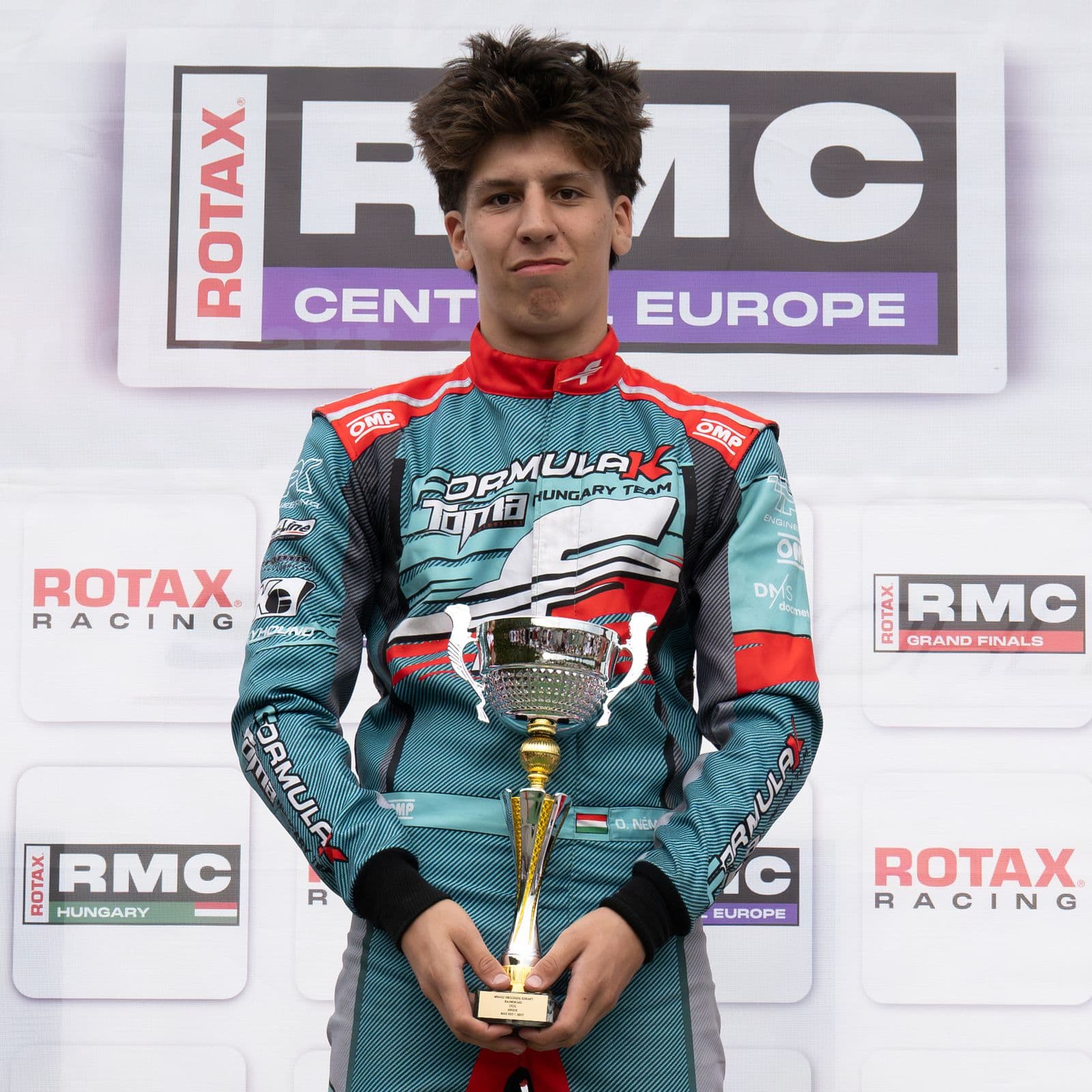 Donát with a trophy at the prize-giving, Bruck