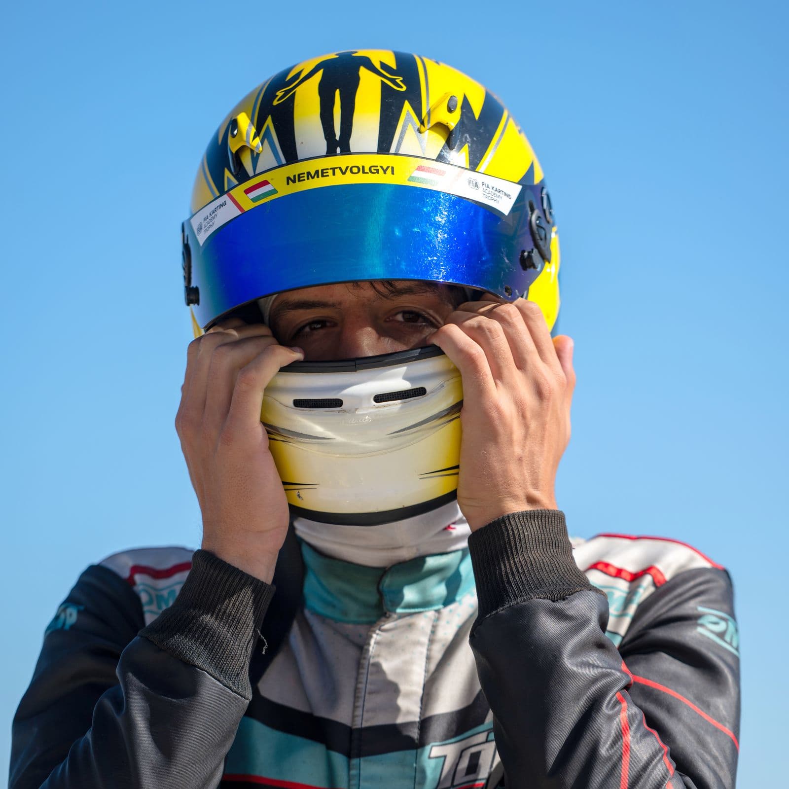 Donát putting on his helmet, Hajdúhadház