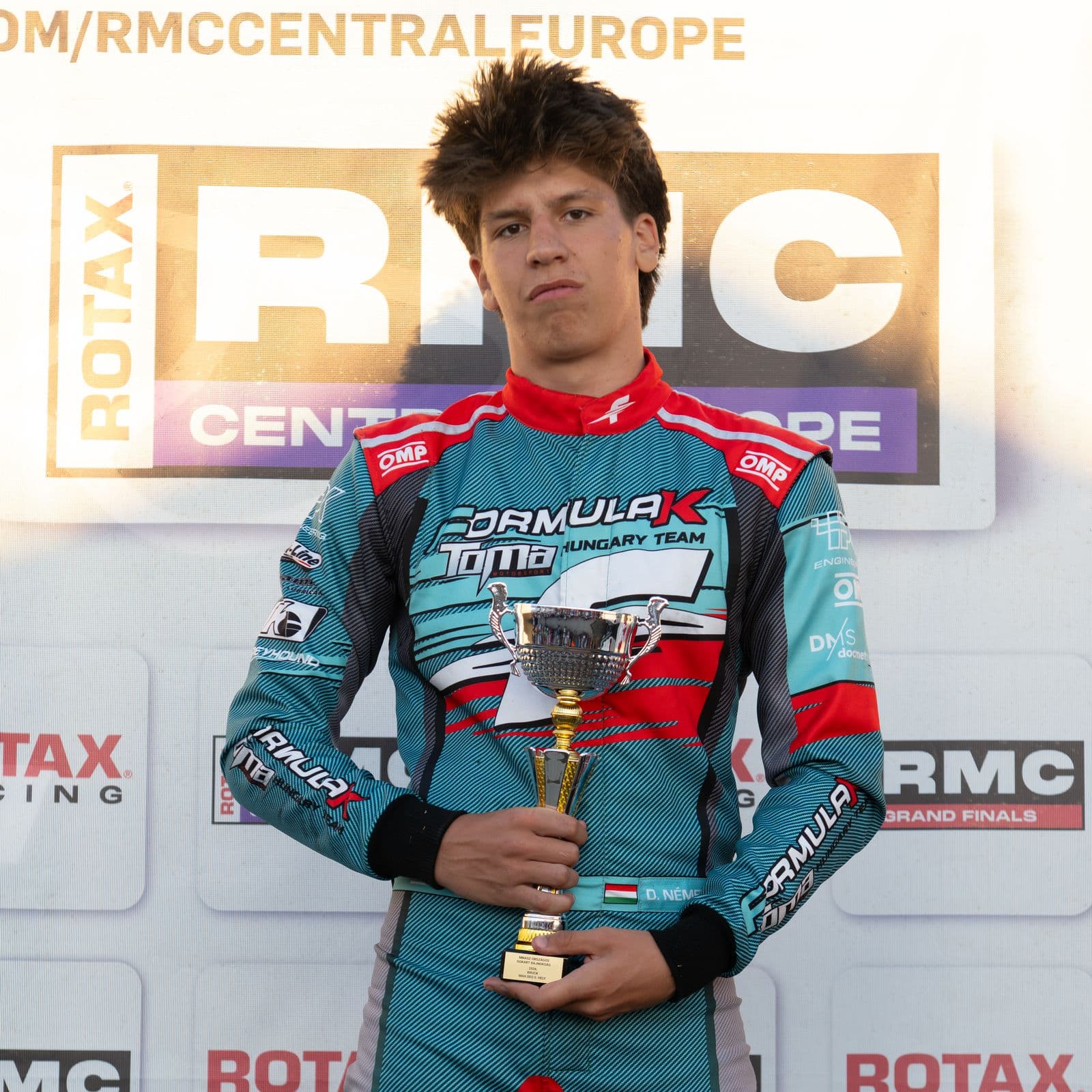Donát with a trophy at the prize-giving, Hajdúhadház