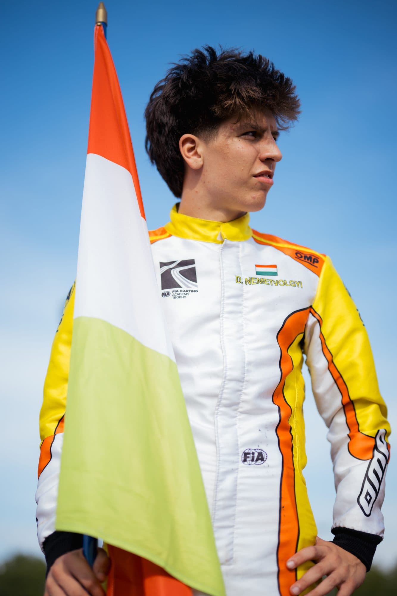 Donát with a flag in his race suit at the RMCIT in Le Mans